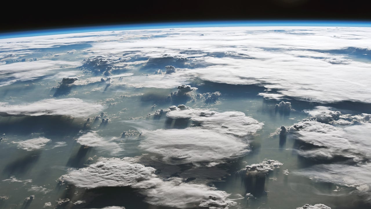 Large anvil clouds above the Amazon in Brazil (© NASA) desktop wallpaper