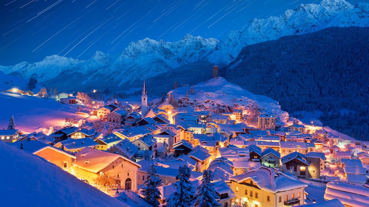 Star trails over Ardez, Graubunden, Switzerland (© Roberto Moiola/Getty Images) desktop wallpaper