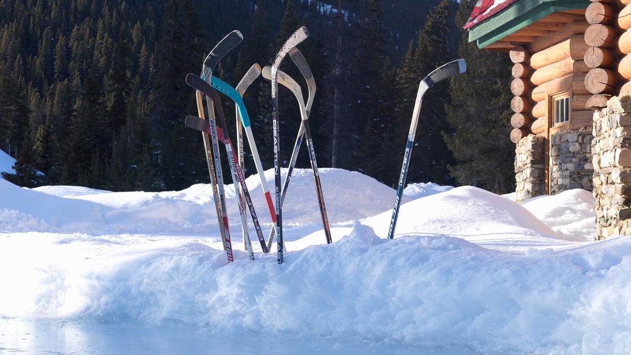 Ice hockey sticks in snow, Banff, Alta. (© Ascent/PKS Media Inc./Getty Images) desktop wallpaper