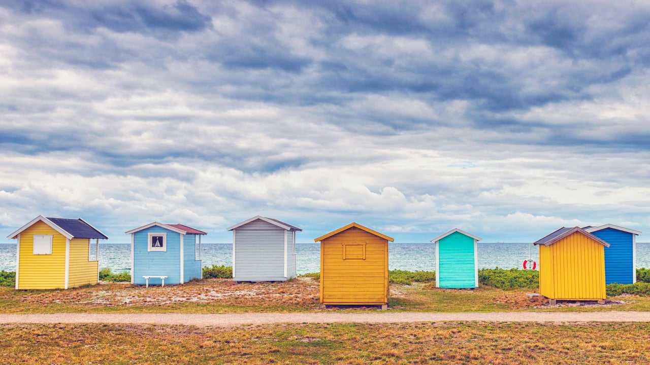 Bathing huts on the beach in Skåne County, Sweden (© Martin Wahlborg/Getty Images) desktop wallpaper