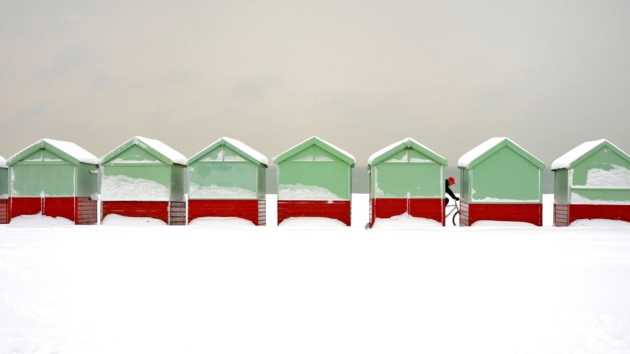 Beach huts covered in snow in Brighton and Hove, England (© Tim Jones/Alamy) desktop wallpaper