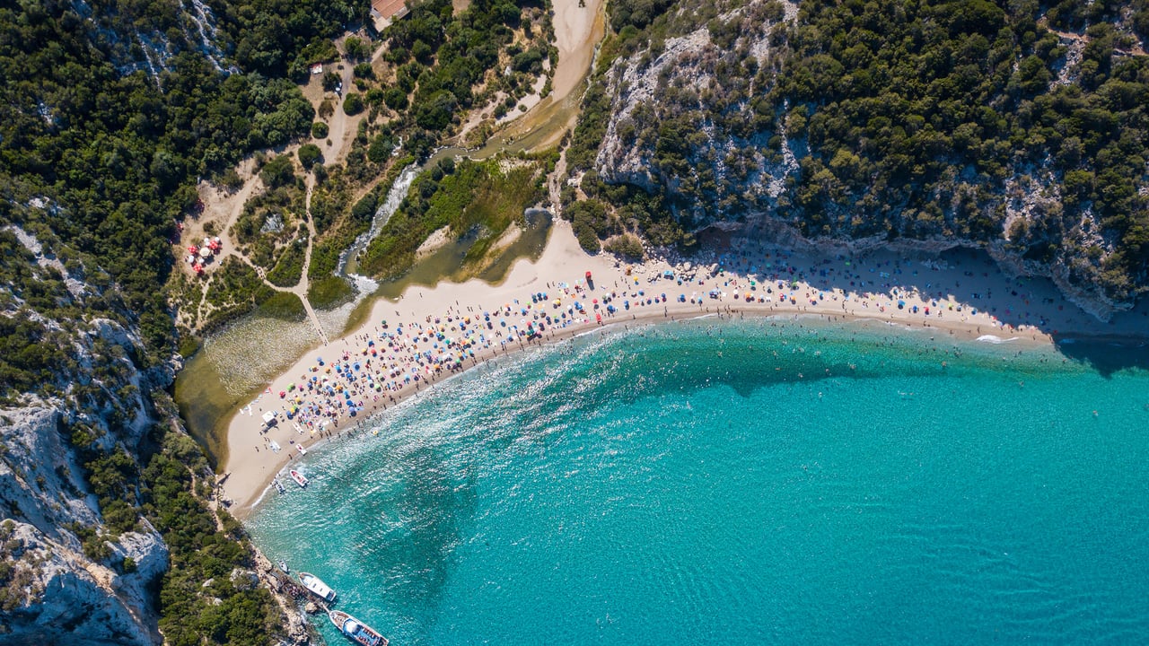 The beach at Cala Luna, Sardinia, Italy (© guenterguni/Getty Images) desktop wallpaper