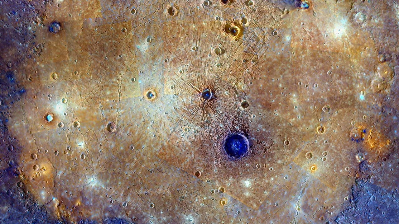 Enhanced-color composite of the Caloris Basin, Mercury (© NASA/Johns Hopkins University Applied Physics Laboratory/Carnegie Institution of Washington) desktop wallpaper