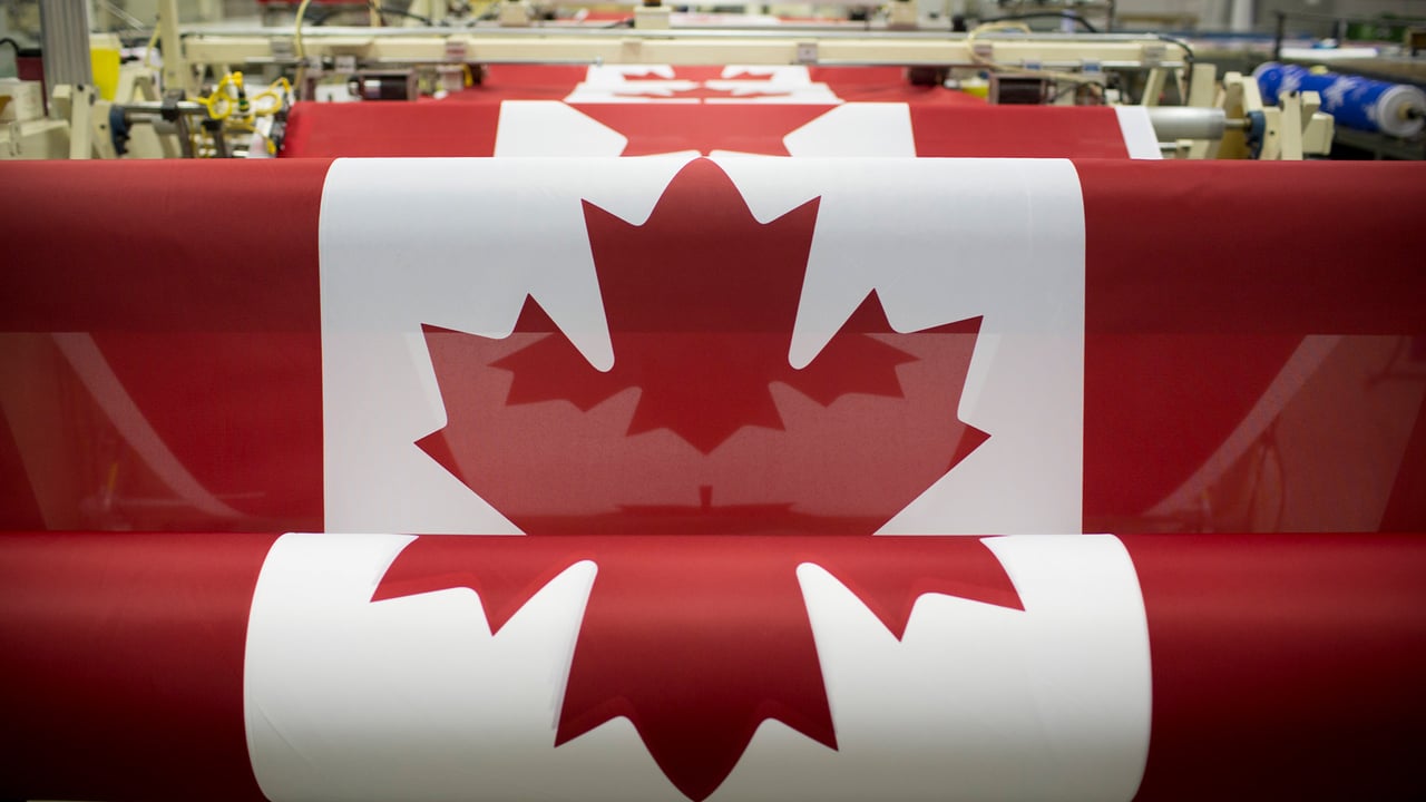 Canadian flags are printed at the Flags Unlimited facility in Barrie, Ont. (© Brent Lewin/Bloomberg via Getty Images) desktop wallpaper