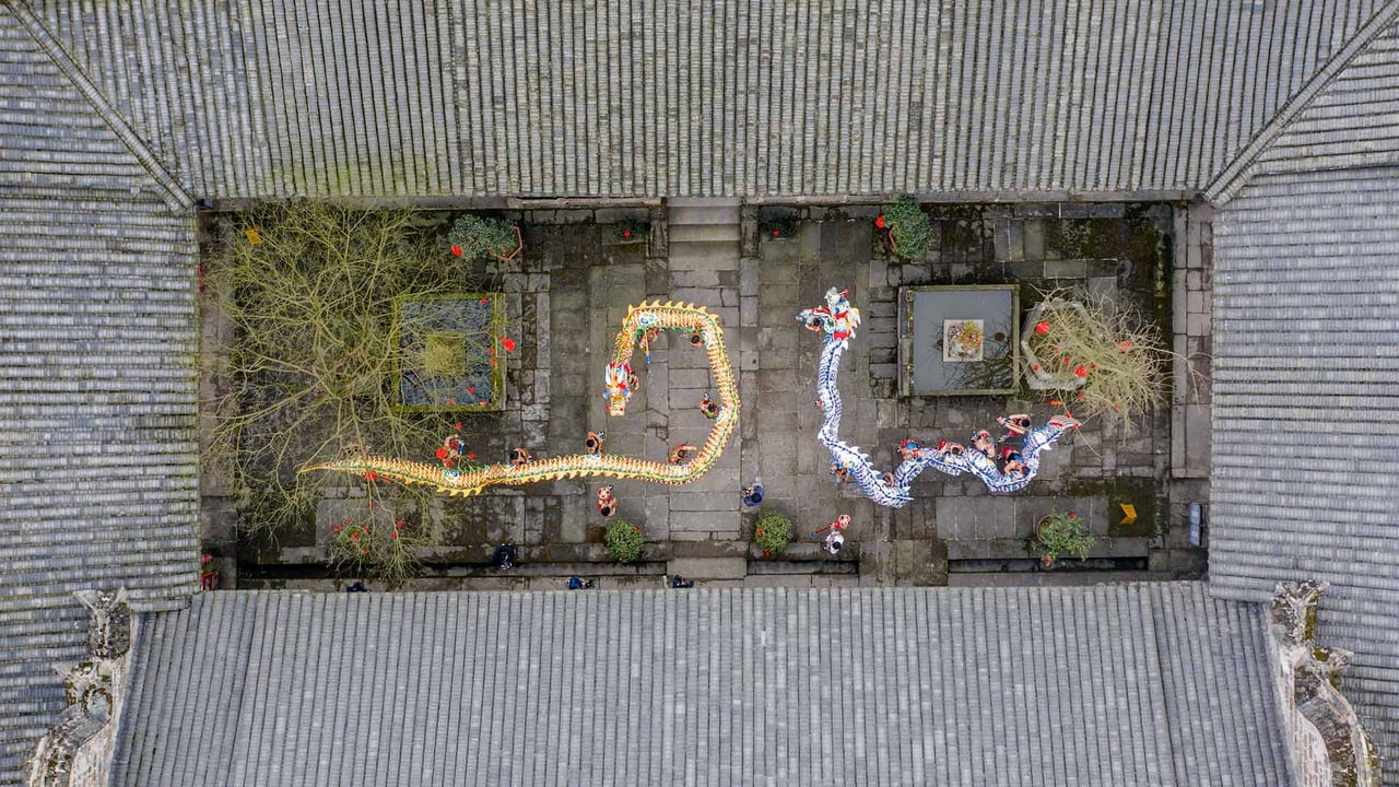 Artists performing the dragon dance for Chinese New Year, Luzhou, China (© Liu Guoxing/VCG via Getty Images) desktop wallpaper