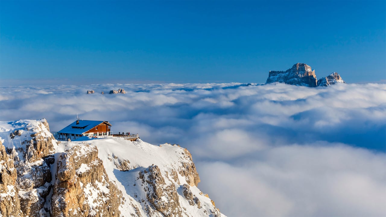 Rifugio Lagazuoi above the clouds with Monte Pelmo in the background, Dolomites, Italy (© Nicolo Miana/eStock Photo) desktop wallpaper