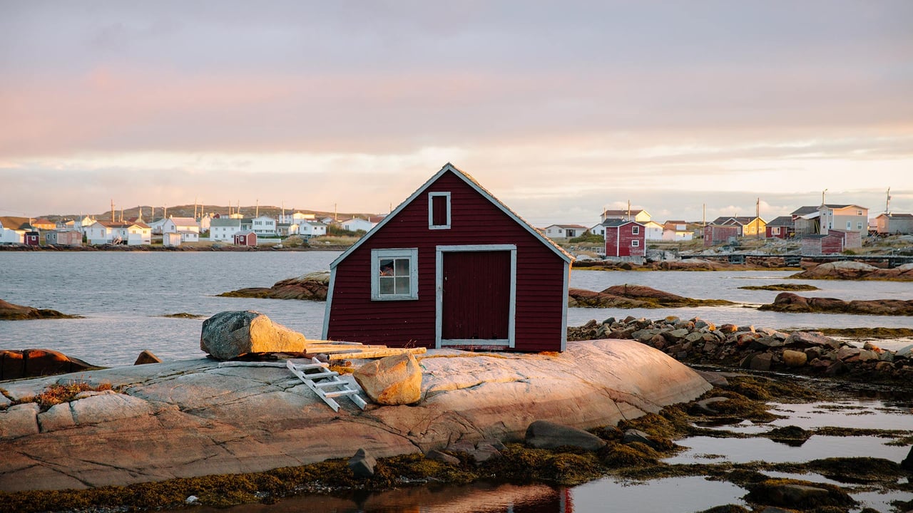 Small red house on the rocky coast of St. John's, Newfoundland and Labrador (© Jessie Brinkman Evans/Offset) desktop wallpaper