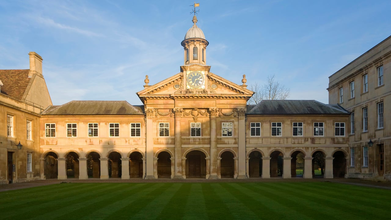 Clock tower of Emmanuel College, University of Cambridge, England (© Geography Photos/Universal Images Group/Getty Images) desktop wallpaper