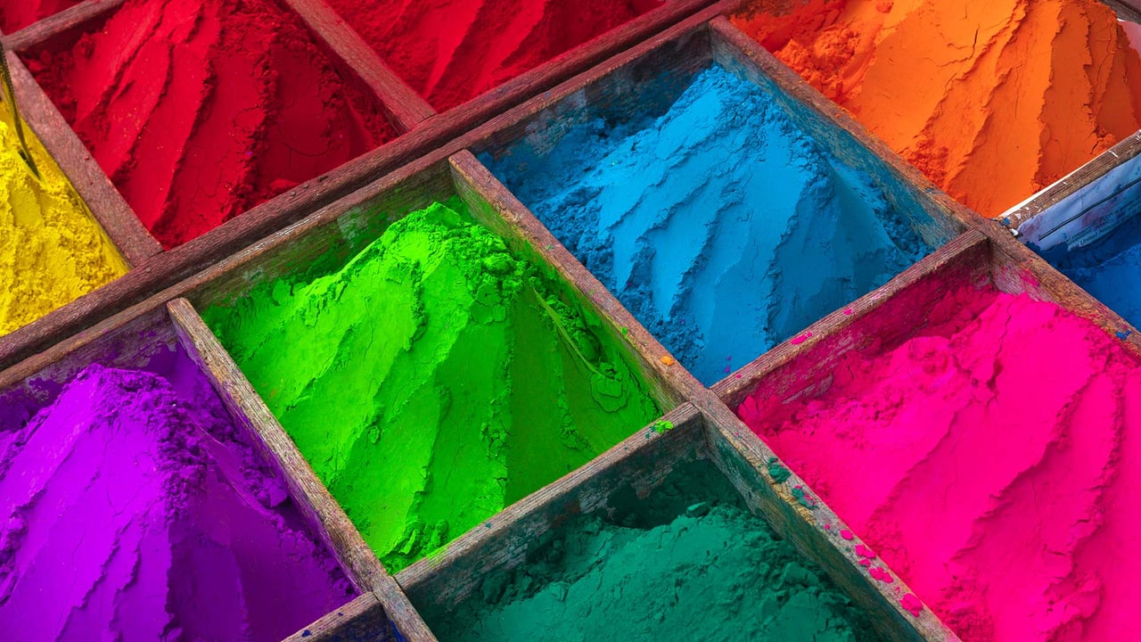 Brightly colored powder for sale during Holi (© Max Bauerfeind/Shutterstock) desktop wallpaper
