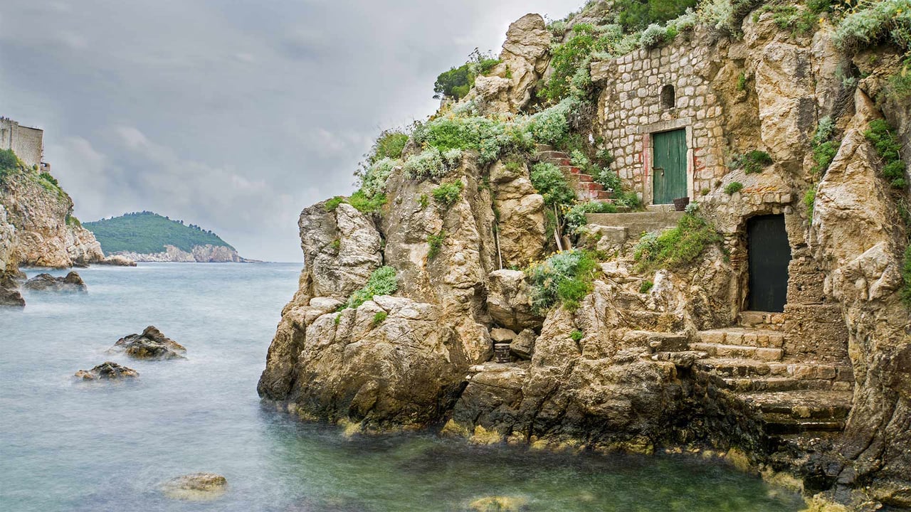 Base of Fort Lovrijenac in Kolorina Bay, Dubrovnik, Croatia (© Barbara Vallance/Getty Images) desktop wallpaper