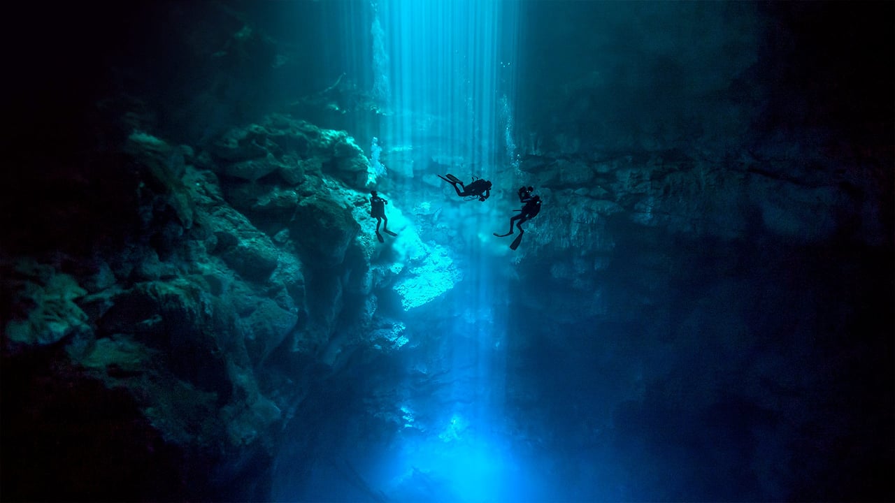 Divers at El Pit Cenote, located in Dos Ojos Natural Park, Quintana Roo, Mexico (© Christia Vizl/Tandem Stills + Motion) desktop wallpaper