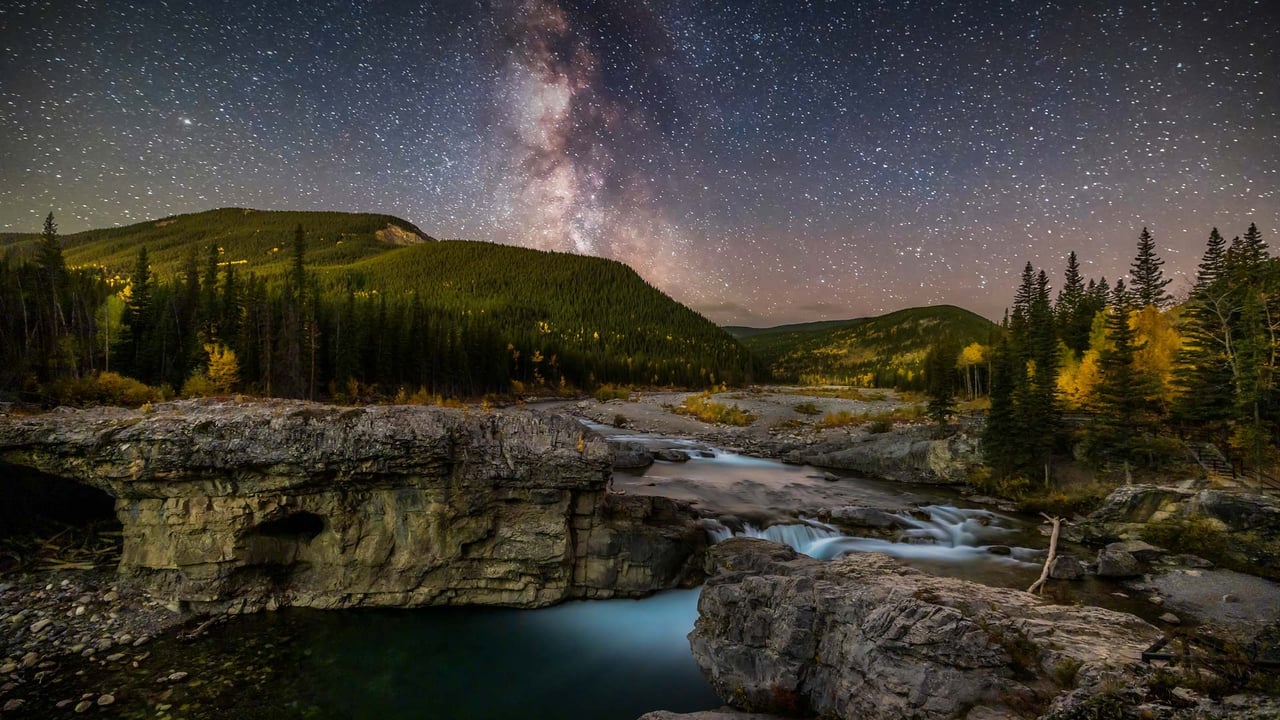 Milky Way over the Elbow River, Alberta, Canada (© Alan Dyer/Getty Images) desktop wallpaper