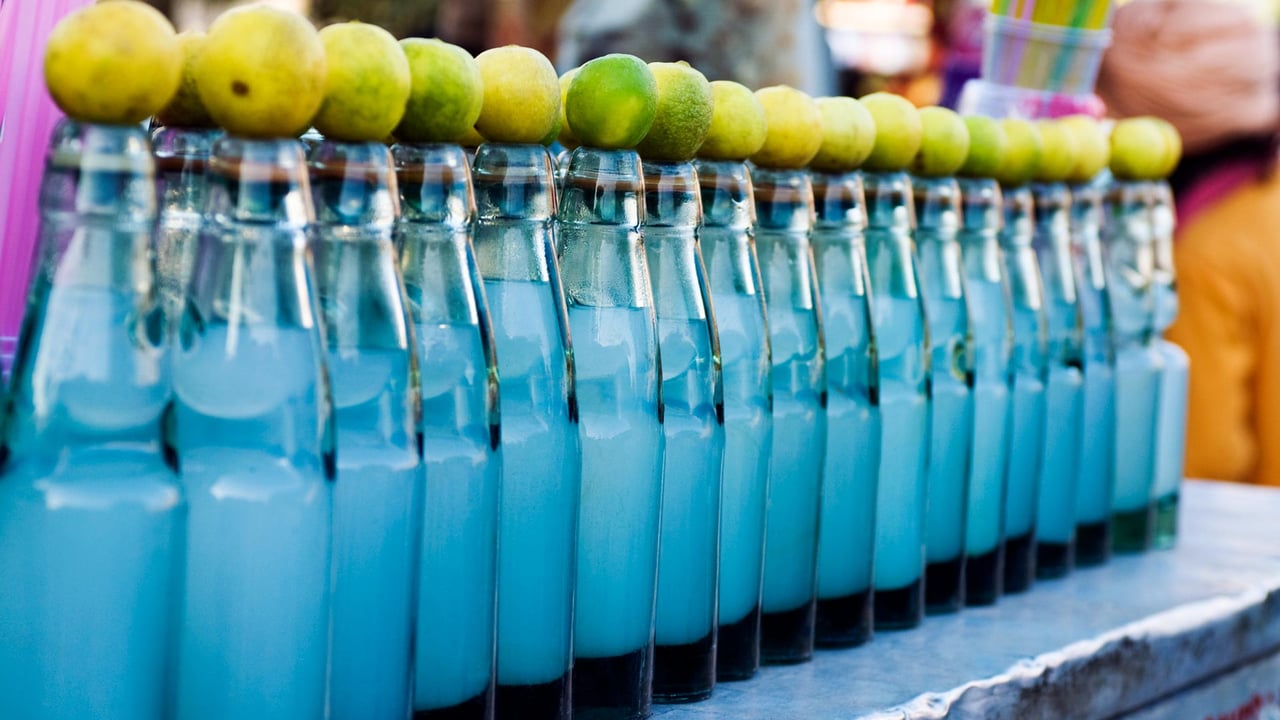 Refreshing soda drinks at a stall in New Delhi (© Masterfile) desktop wallpaper