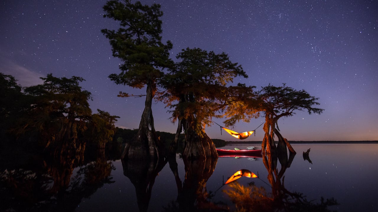 Hammock camping on a lake in Central Florida (© Mac Stone/Tandem Stills + Motion) desktop wallpaper