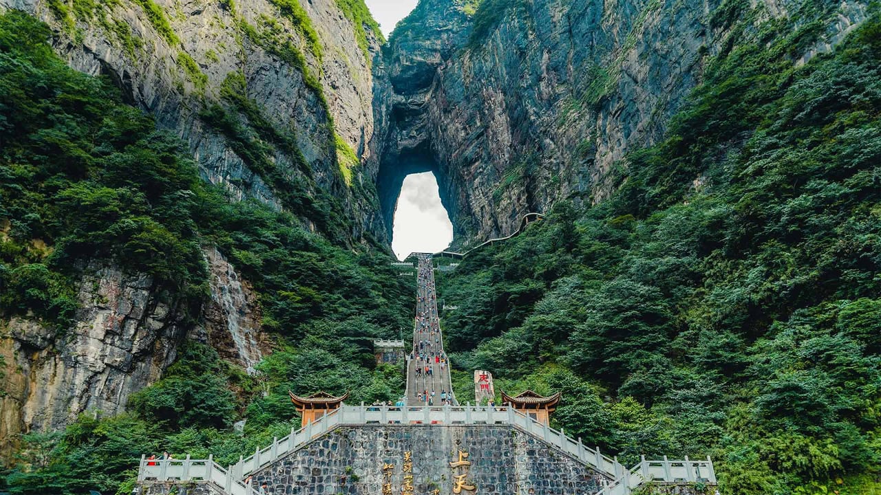 Tianmen Mountain in Zhangjiajie, China (© Bogdan Dyiakonovych/Shutterstock) desktop wallpaper