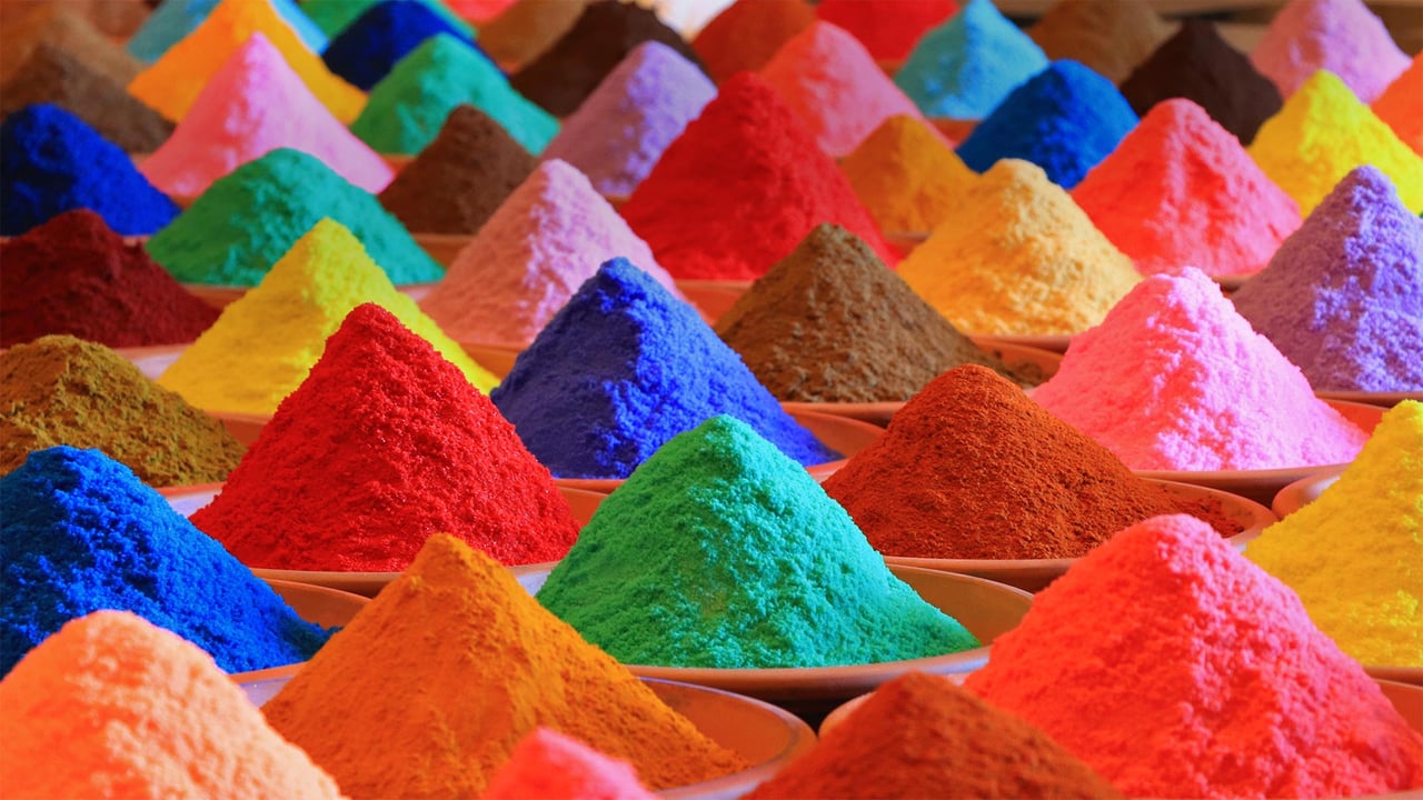 Multicolored powders for sale during Holi (© Nuno Valadas/Getty Images) desktop wallpaper