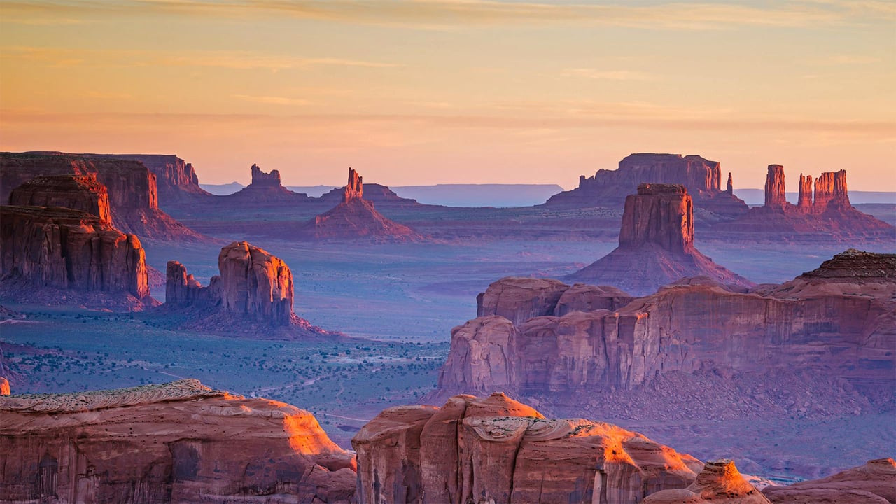 A view of Monument Valley Navajo Tribal Park from Hunts Mesa, Navajo Nation, between Arizona and Utah (© AWL Images/Danita Delimont) desktop wallpaper
