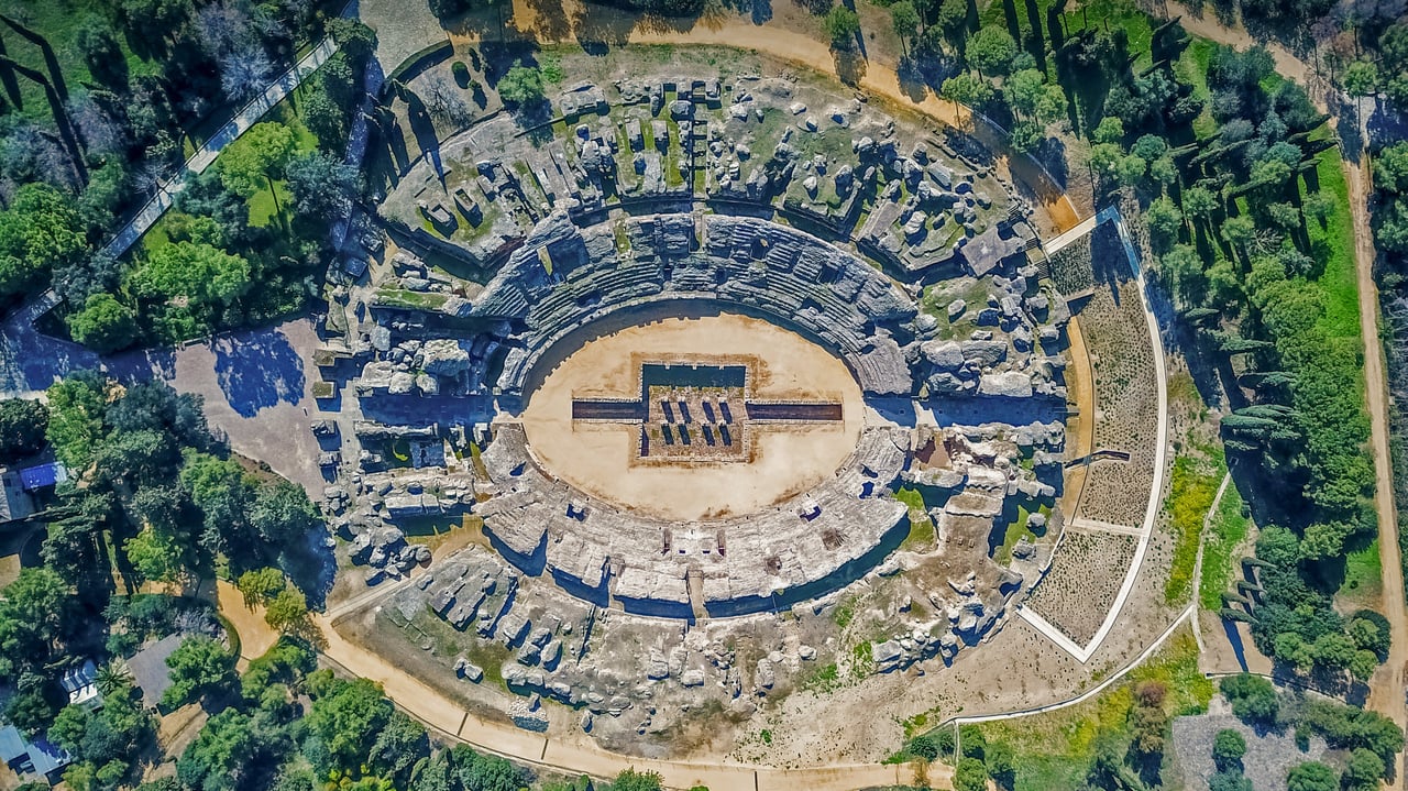 The Roman amphitheater of Itálica, near Seville, Spain (© Amazing Aerial Agency/Offset by Shutterstock) desktop wallpaper