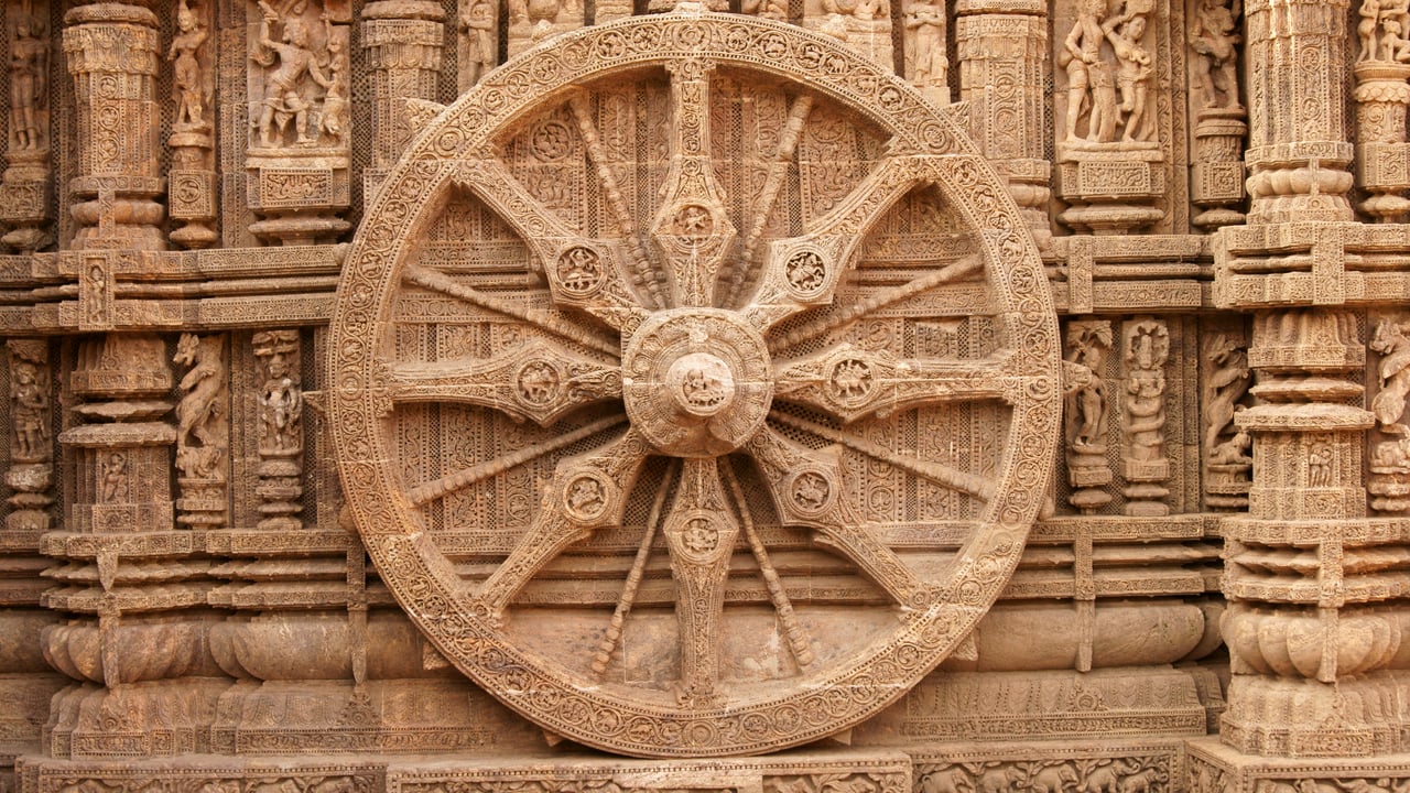 A stone wheel engraved in the walls of the Konarak Sun Temple in Orissa, India (© JeremyRichards/Getty Images) desktop wallpaper