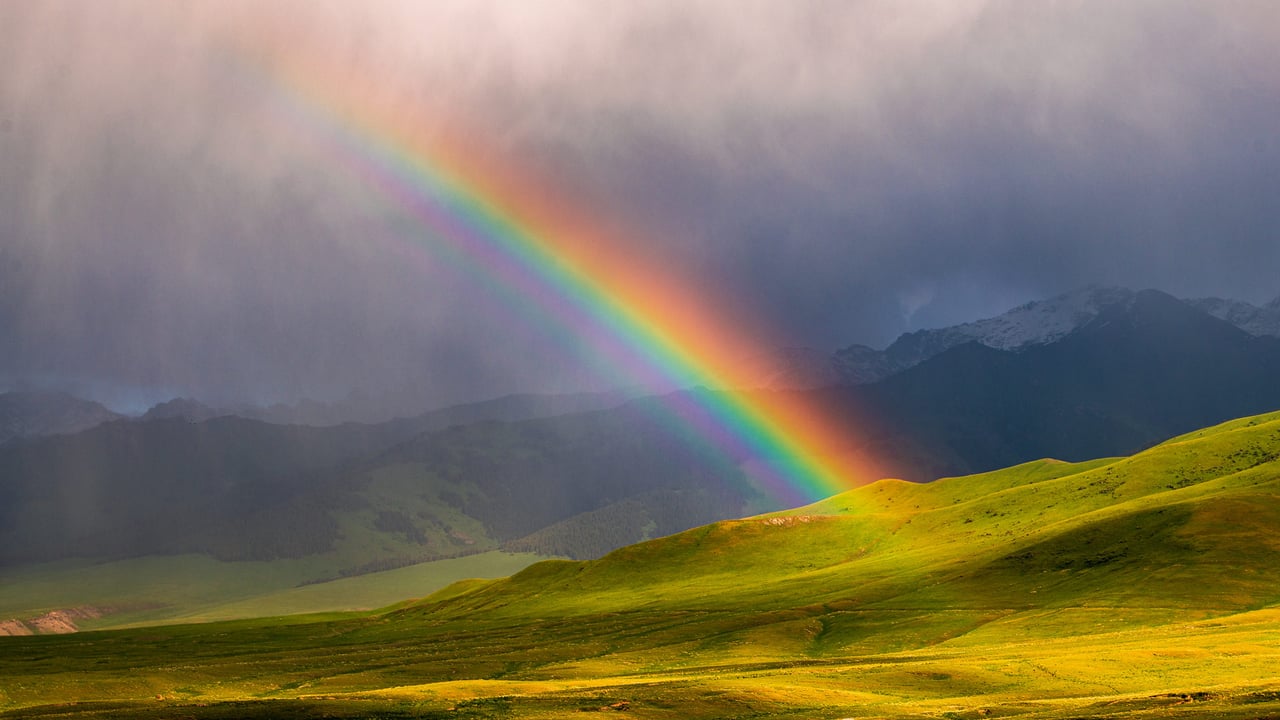 A rainbow in At-Bashy District , Kakshaal Too Mountains, Naryn Province, Kyrgyzstan (© Emad aljumah/Getty Images) desktop wallpaper