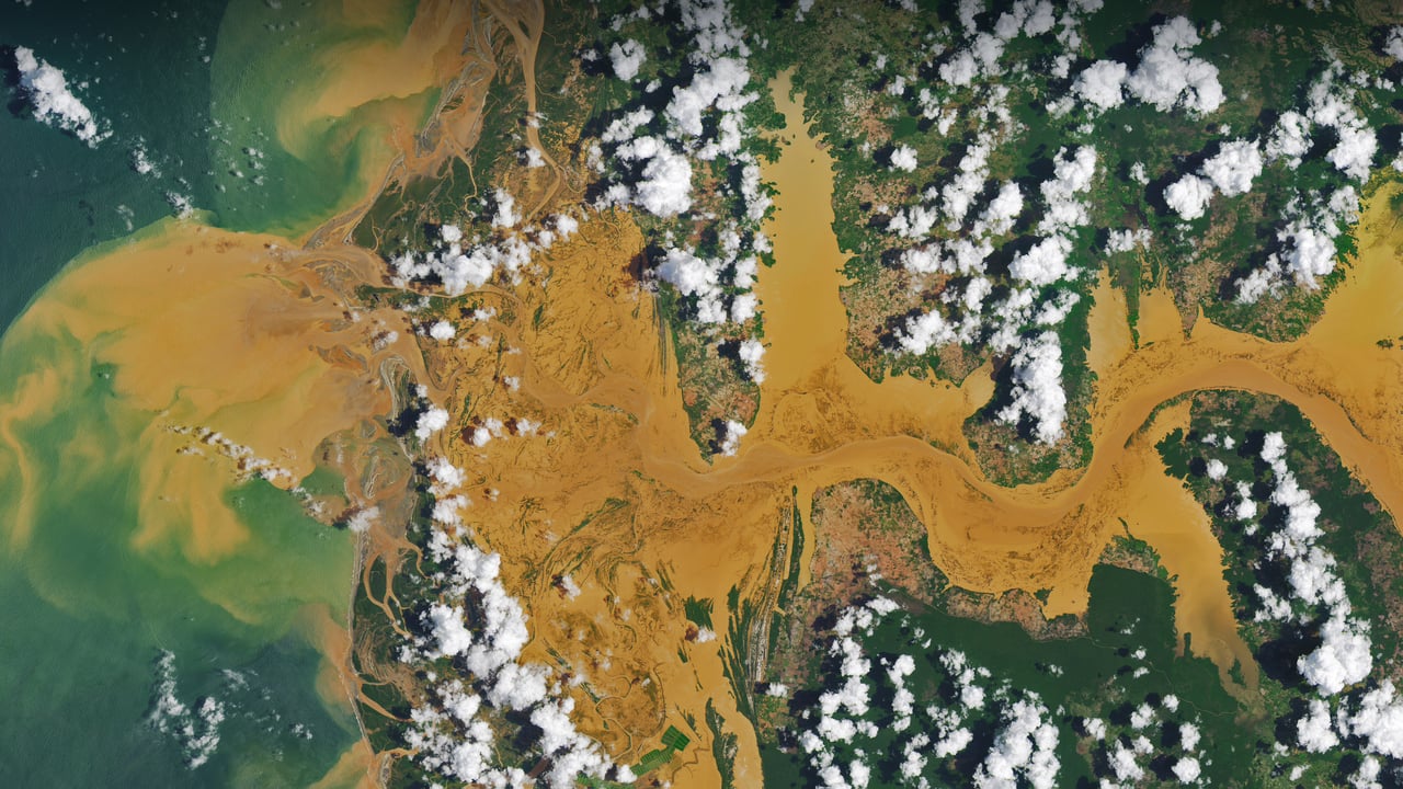 Satellite image of the Mania River in Madagascar (© NASA Earth Observatory image by Joshua Stevens, using Landsat data from the US Geological Survey) desktop wallpaper