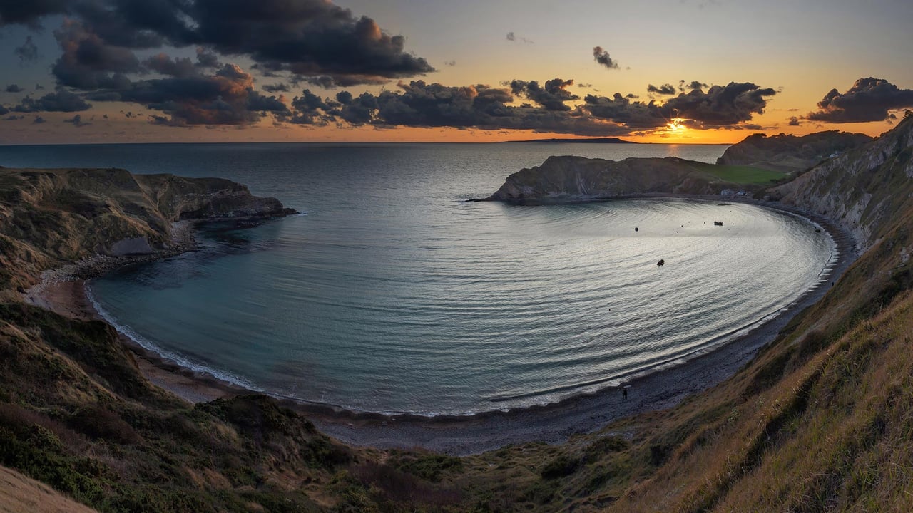 Panoramic view of Lulworth Cove at sunset in Dorset, England (© Adrian Baker/Shutterstock) desktop wallpaper