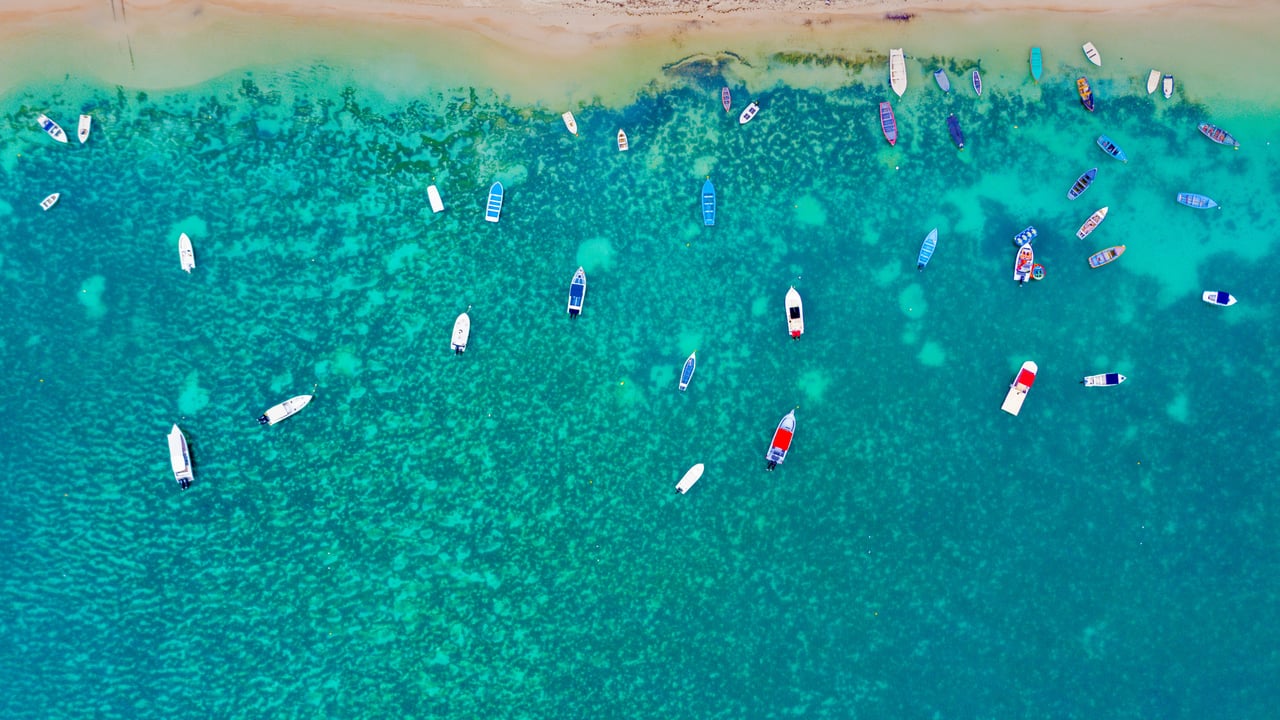 Mont Choisy Beach, Mauritius (© Robert Harding World Imagery/Offset by Shutterstock) desktop wallpaper