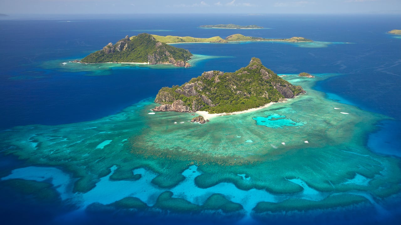 Coral reef surrounding the island of Monuriki, Mamanuca Islands, Fiji (© David Wall/SuperStock) desktop wallpaper