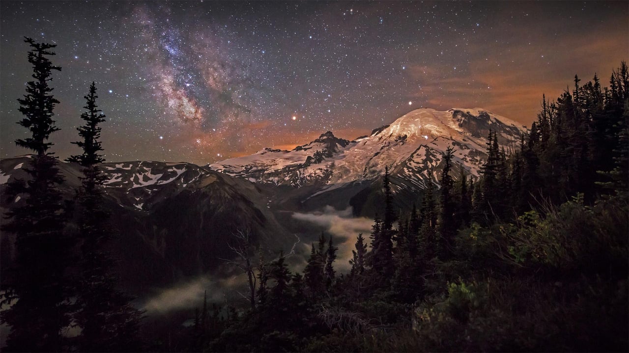 Moonlight and the Milky Way over Mount Rainier in Mount Rainier National Park, Washington (© Brad Goldpaint/Cavan) desktop wallpaper