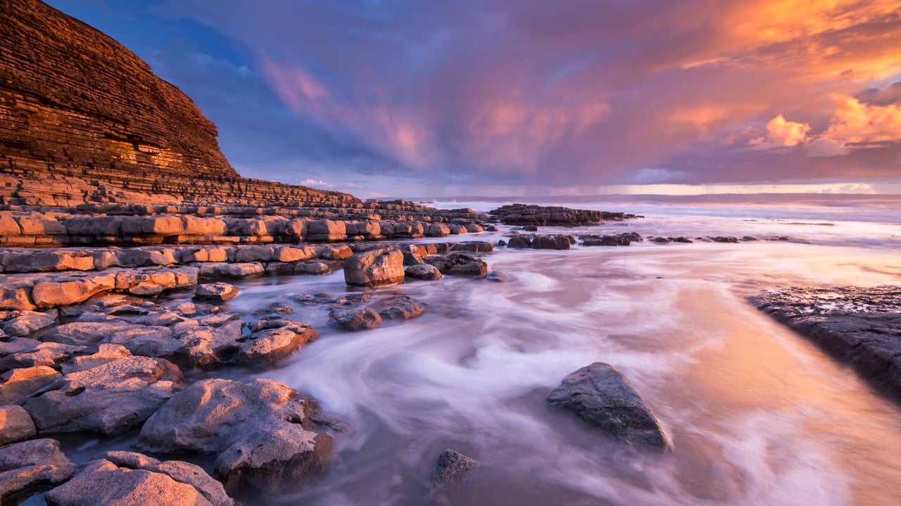 Sunset over Nash Point on the Glamorgan Heritage Coast, South Wales in winter. (© AWL Images/DanitaDelimont.com) desktop wallpaper