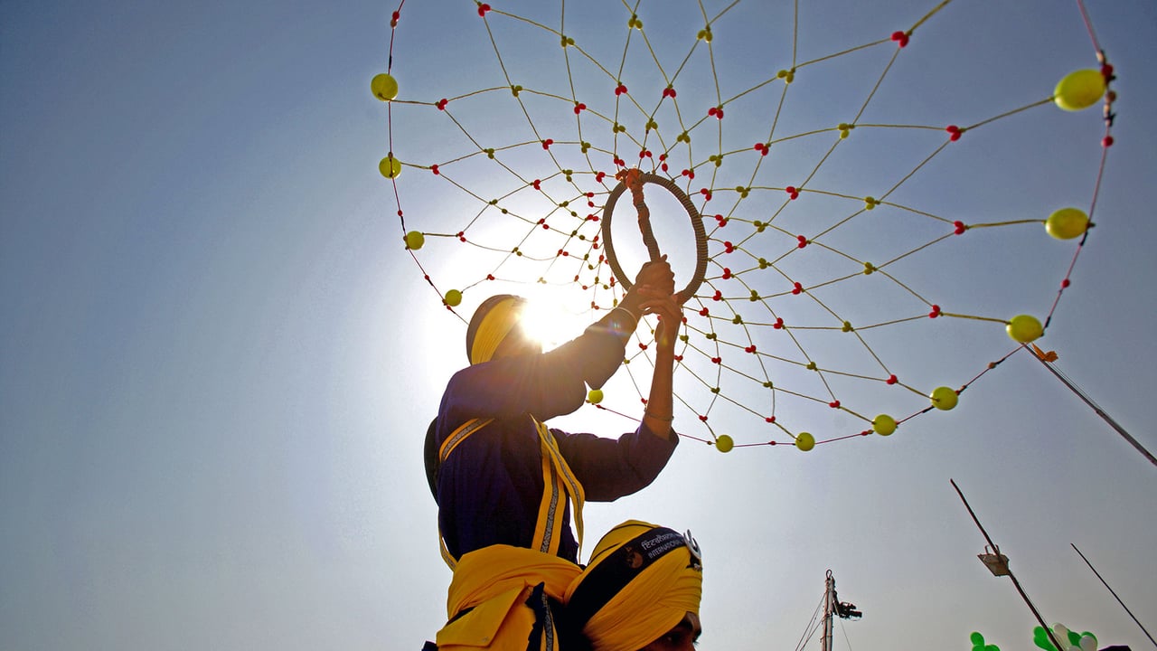 Nihangs performing the Gatka in celebration of the 300th year of consecration of the Guru Granth Sahib, Maharashtra (2008). (© Dinodia Photo/age fotostock) desktop wallpaper