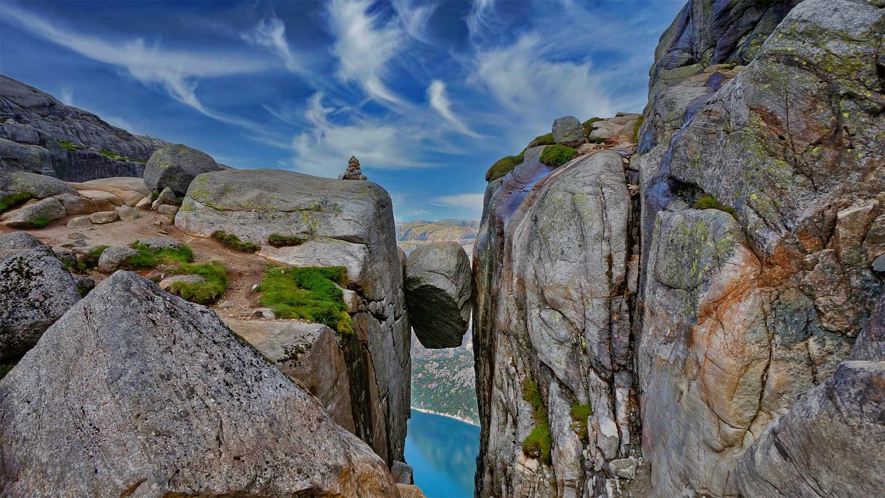 The Kjeragbolten boulder on the mountain Kjerag in Rogaland county, Norway (© Angel FAyE/Getty Images) desktop wallpaper