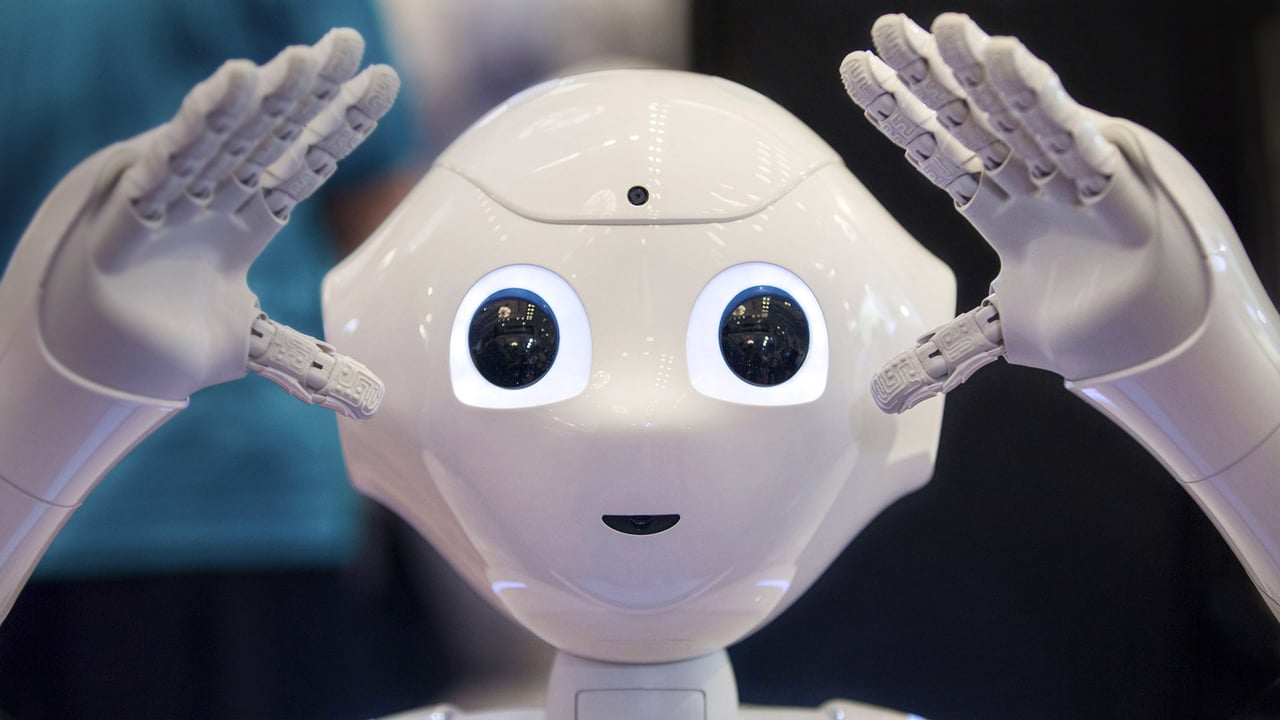 Pepper, SoftBank Robotics' humanoid robot, on display in Tokyo (© Christopher Jue/EPA/Shutterstock) desktop wallpaper