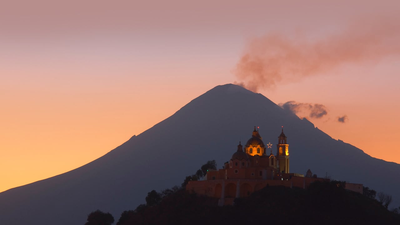 Church of Nuestra Señora de los Remedios and Popocatépetl, Puebla, Mexico (© Radius Images/Shutterstock) desktop wallpaper