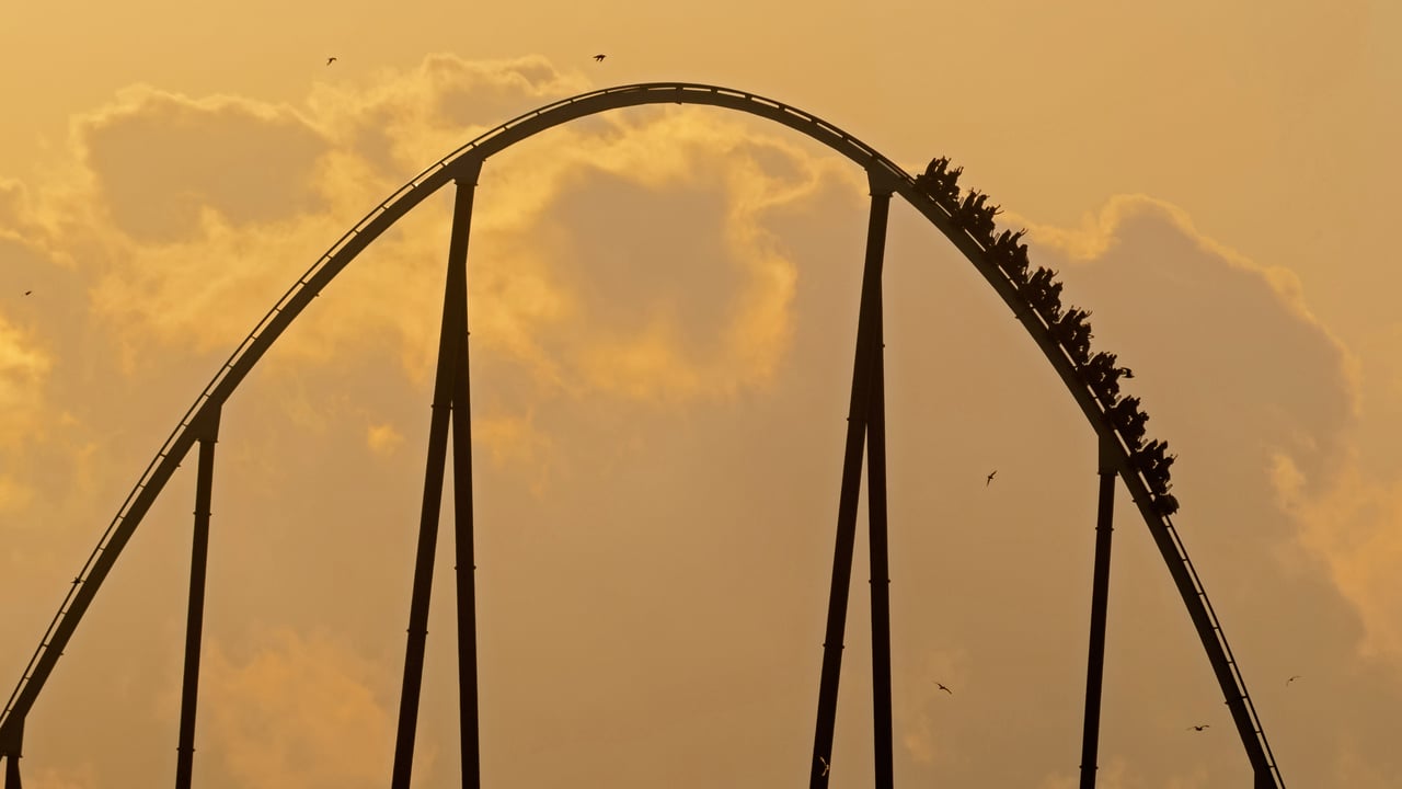 Silhouette of Shambhala roller coaster at sunset in PortAventura Park, Salou, Tarragona, Spain (© Joaquim F. P./Getty Images) desktop wallpaper