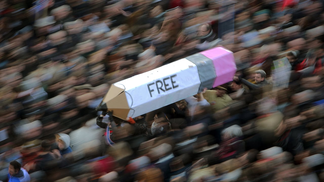Une manifestation pour la liberté de la presse à Paris après les attentats sur Charlie Hebdo du 11 Janvier 2015 (© Fredrik von Erichsen/picture alliance via Getty Images) desktop wallpaper