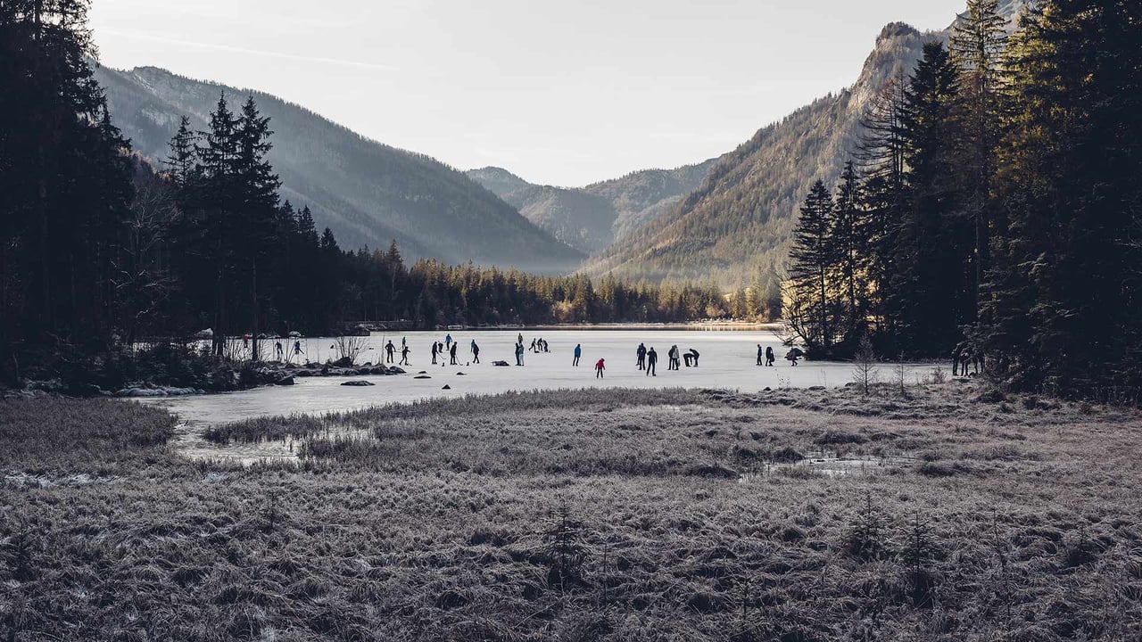 Ice skaters on Hintersee, a lake in Ramsau, Berchtesgadener Land, Bavaria, Germany (© Jana Mänz/Westend61/Offset) desktop wallpaper