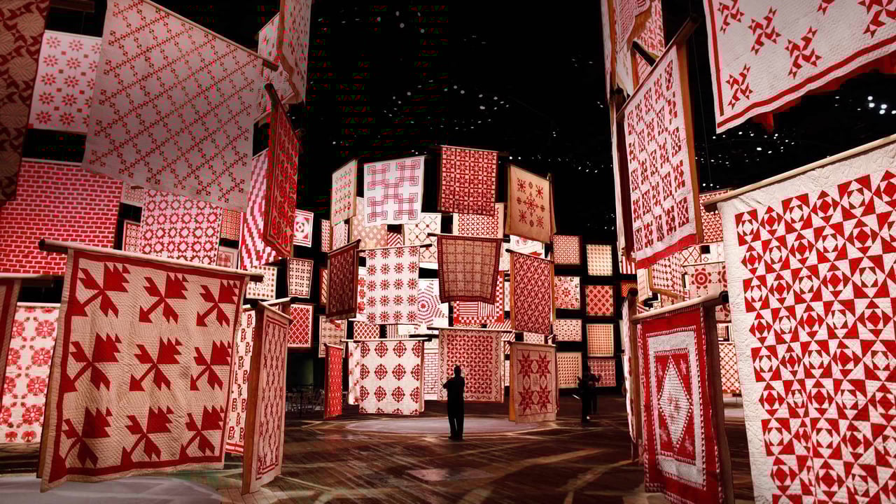 'Infinite Variety: Three Centuries of Red and White Quilts' at the American Folk Art Museum in New York City in 2011, for National Quilting Day (© Shannon Stapleton/Reuters) desktop wallpaper