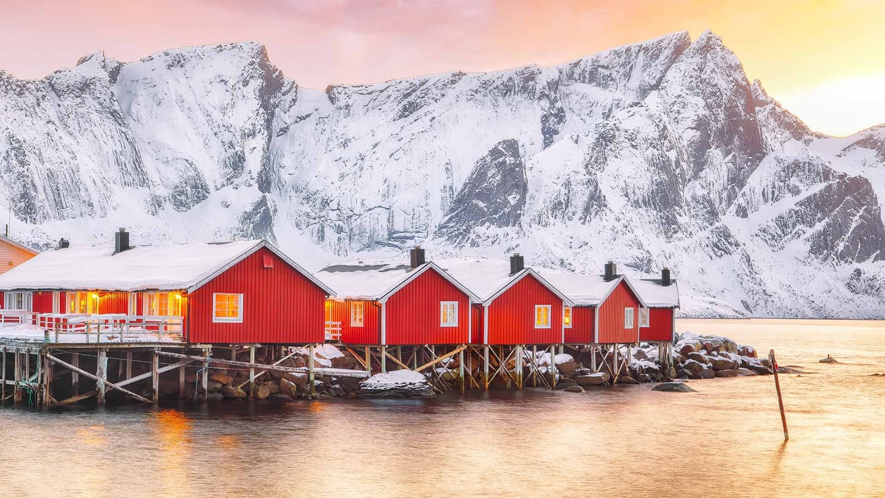 Traditional red fishermen's cabins on the shore of Reinefjorden, Norway (© Pilat666/Getty Images) desktop wallpaper
