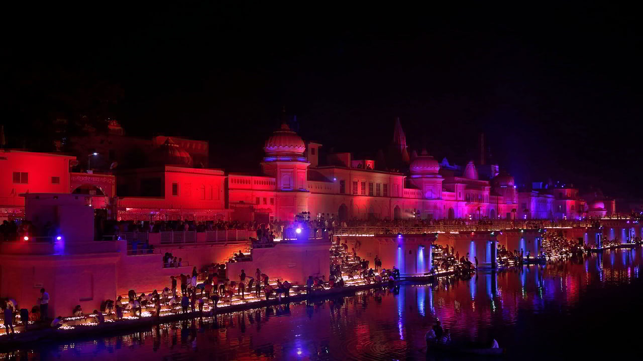 Devotees light oil lamps on the banks of the Sarayu River in Ayodhya, India (© Rajesh Kumar Singh/AP Photo) desktop wallpaper
