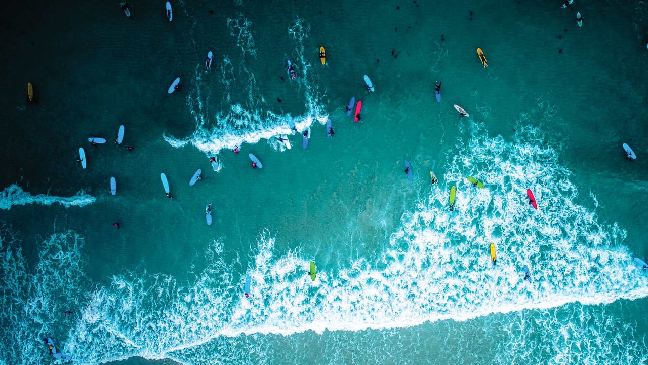 Aerial view of surfers in Cornwall for International Surfing Day (© Matt Cooper/Gallery Stock) desktop wallpaper
