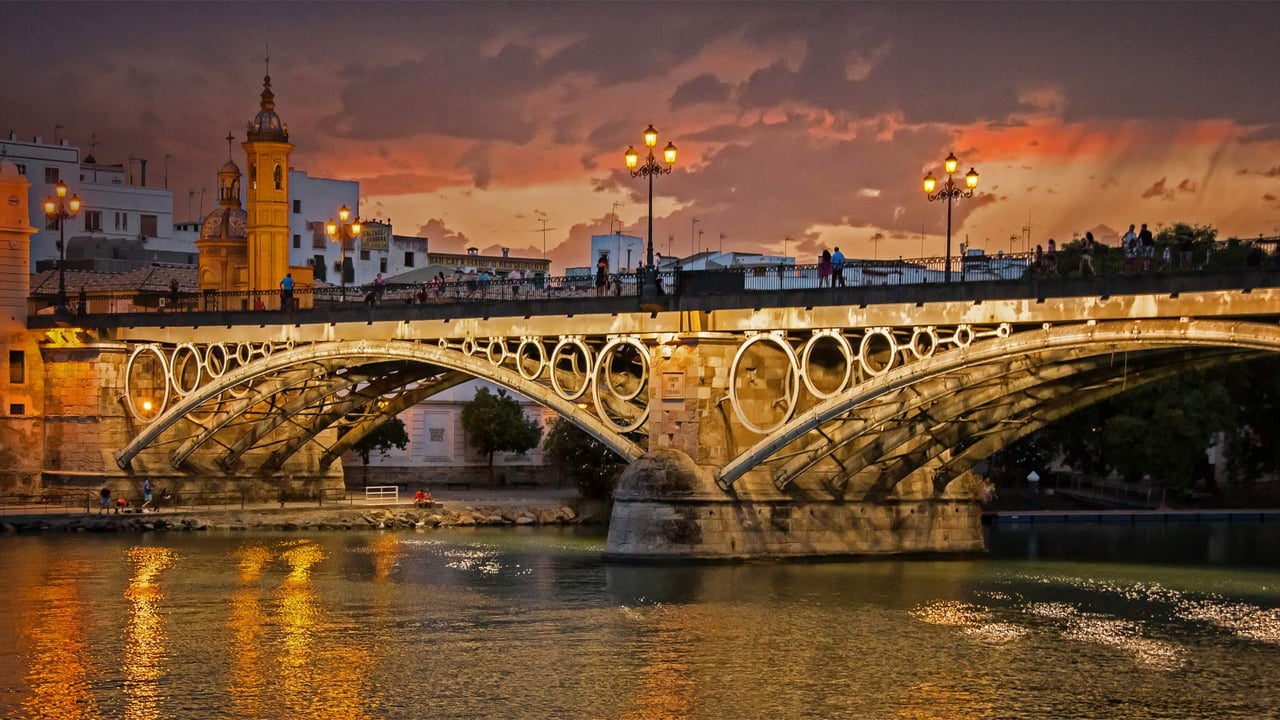 Seville, Spain’s Guadalquivir River and Triana Bridge for the 500th anniversary of Magellan’s departure (© Zu Sanchez Photography/Getty Images) desktop wallpaper