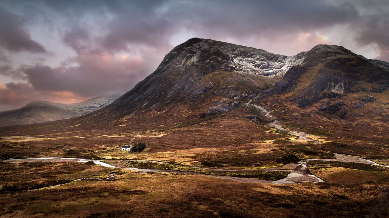 The Lagangarbh hut nestles in the valley beneath Buachaille Etive Mòr, Glencoe (© Sophia Spurgin Photography/iStock/Getty Images Plus) desktop wallpaper