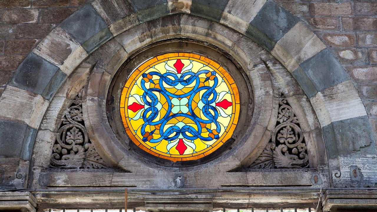 Colourful stained-glass window at the CST railway station (earlier Victoria Terminus), Mumbai (© Natalie Solveland/Alamy Stock Photo) desktop wallpaper