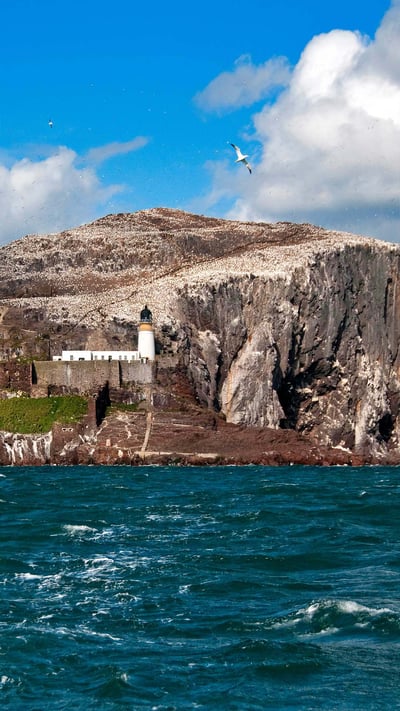 The Bass Rock in Scotland’s Firth of Forth (© Richard Shucksmith/Minden Pictures) mobile wallpaper
