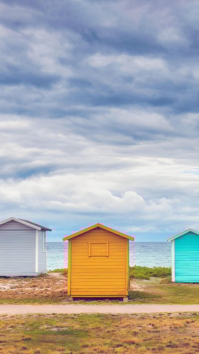 Bathing huts on the beach in Skåne County, Sweden (© Martin Wahlborg/Getty Images) mobile wallpaper