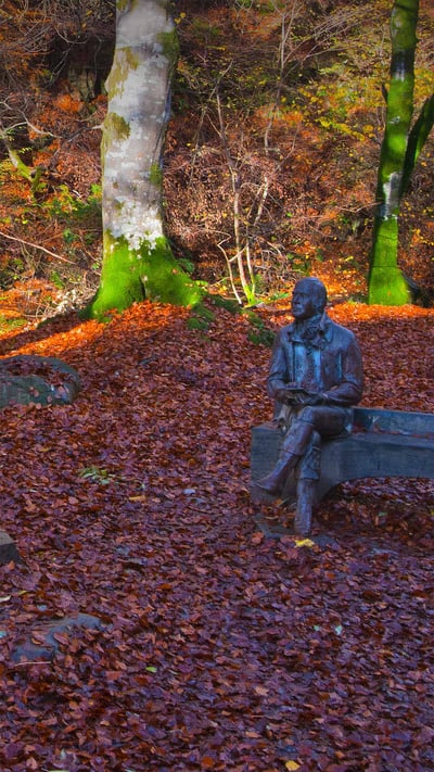 Statue of Robert Burns in the Birks of Aberfeldy, Perth and Kinross, Scotland (© Dennis Barnes/Getty Images) mobile wallpaper