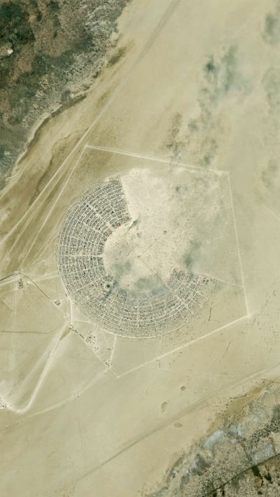 Satellite image of the Burning Man festival in Black Rock City, Nevada (© DigitalGlobe/ScapeWare3d/Getty Images) mobile wallpaper