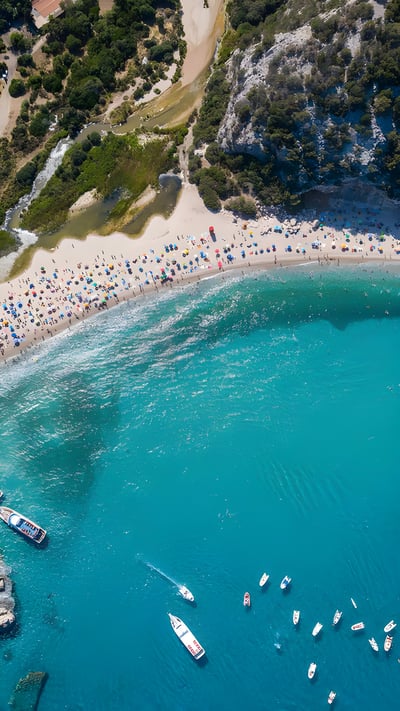 The beach at Cala Luna, Sardinia, Italy (© guenterguni/Getty Images) mobile wallpaper