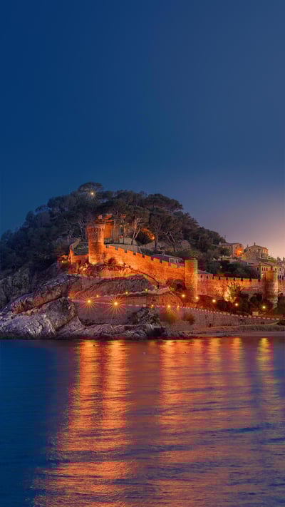 The medieval walled town in Tossa de Mar, Catalonia, Spain (© dleiva/Alamy) mobile wallpaper